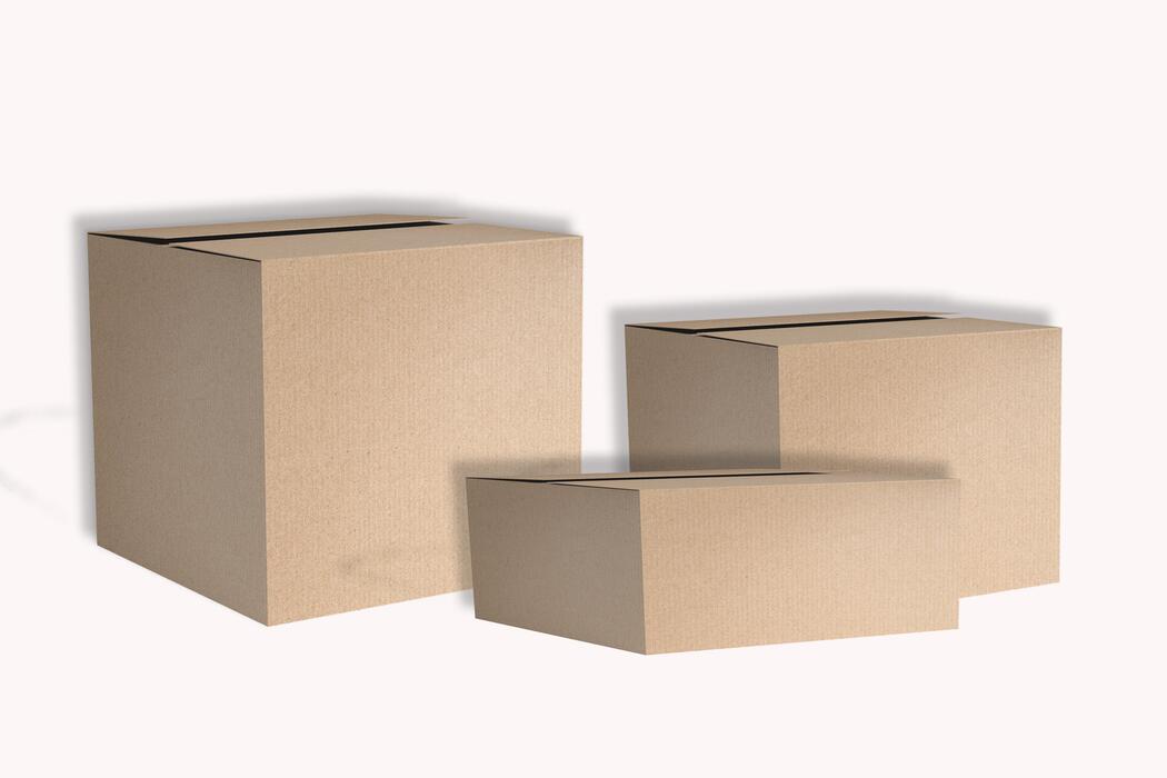 Heavy-duty corrugated carton boxes used by Anagki Logistics for securely packing household goods, office equipment, electronics, kitchenware, books, and fragile items during moving and storage.